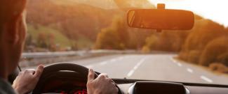 Driver looking at the open road ahead — tax planning looks forward, not backward